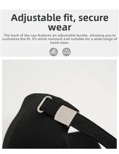 Detail of adjustable metal buckle on black baseball cap with breathable fabric texture