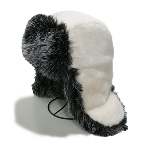 Winter faux fur trapper hat in black and white plush design for cold weather protection