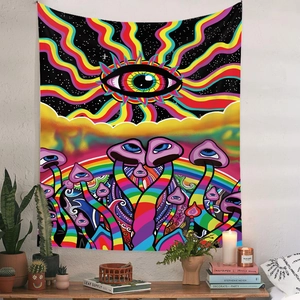 Detail of psychedelic tapestry featuring rainbow eyes and mushrooms against a starry sky