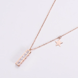 Rose gold necklace with a rectangular rhinestone pendant and star detail on a fine O-chain
