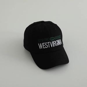 Detailed close-up of embroidered West Virginia lettering on a black cotton baseball cap