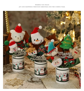 Christmas plush dolls in decorative buckets featuring Santa and Reindeer on artificial snow