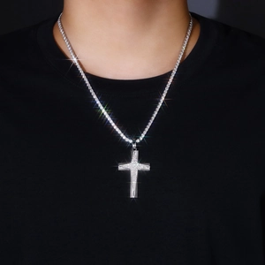 Close-up of S925 sterling silver hip hop cross pendant with tennis chain and moissanite