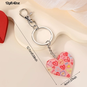 Pink heart acrylic keychain with size labels 12.7cm length and silver lobster clasp
