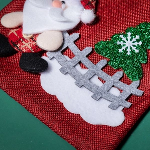 Festive red burlap Christmas gift bag with 3D Santa Claus and sequin tree decoration