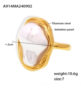 Detail of titanium steel ring with irregular pearl, weighing 10.6g and size 7