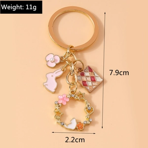 Detail view of rabbit keychain dimensions showing length of 7.9cm and weight of 11g
