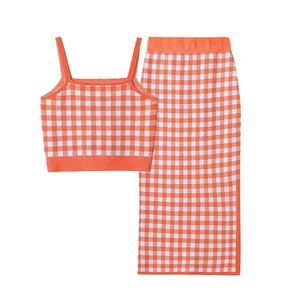 Orange and white plaid knit set featuring a cropped camisole top and split pencil skirt