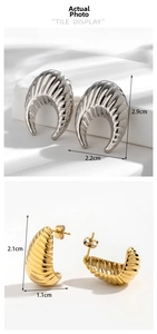 Detailed view of C-shaped textured earrings in silver and gold with size dimensions