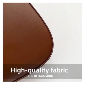 Close-up of premium dark brown lychee textured leather showing detailed edge stitching