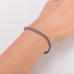 Minimalist silver chain bracelet for couples shown on a wrist with sleek hip-hop style
