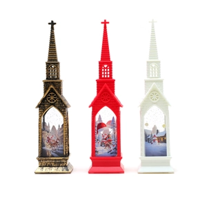 Three Christmas church-shaped lanterns in bronze, red, and white with festive holiday scenes