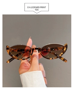 Detail of leopard print cat eye sunglasses with high quality tea tinted lenses