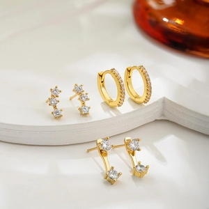 Set of three 18K gold plated stud and hoop earrings with sparkling cubic zirconia
