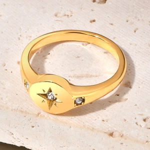 18K gold plated signet ring with engraved star pattern and three small diamonds