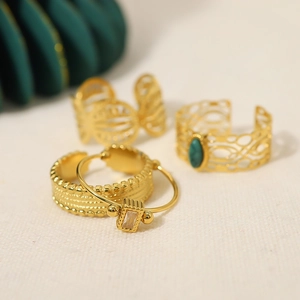 Set of vintage 18k gold plated stainless steel rings with turquoise and butterfly designs