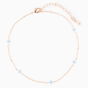 Close-up of golden anklet featuring five light blue clover charms on a white background