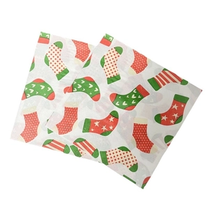 Christmas stocking printed paper napkins for festive parties and holiday table settings