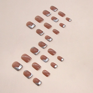 Short square press-on nails with silver abstract lines and French tips in nude pink