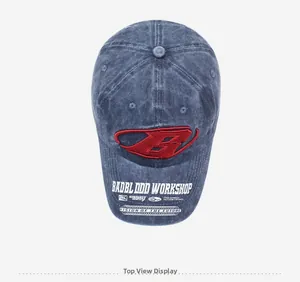 Top view of vintage blue washed denim baseball cap with red embroidered B logo
