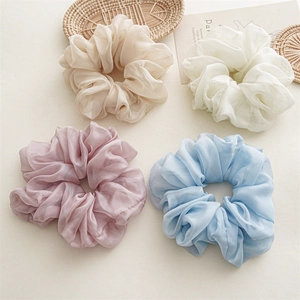 Set of four pastel chiffon organza scrunchies in beige white pink and blue colors