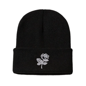 Casual black knit beanie for women featuring a delicate white rose flower embroidery detail
