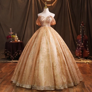 Elegant champagne gold ball gown evening dress with sequined embroidery and off-shoulder sleeves