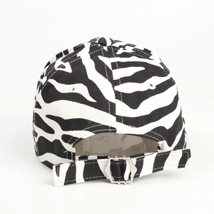 Rear view of zebra print baseball cap showing fabric texture and metal adjustable buckle