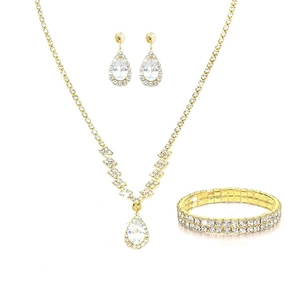 Detailed set of gold-toned jewelry featuring teardrop pendants and sparkling rhinestones