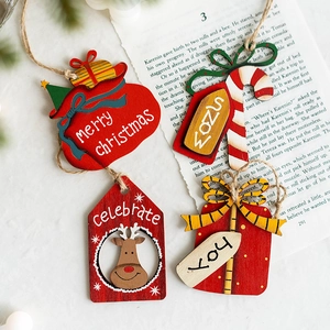 Set of 4 wooden Christmas ornaments including reindeer and stockings on rustic background