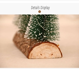 Detailed view of mini snow-flocked Christmas trees on natural rustic wooden bases