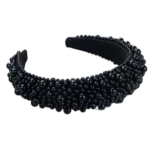 Elegant wide black headband adorned with faux pearls for a high skull top hairstyle