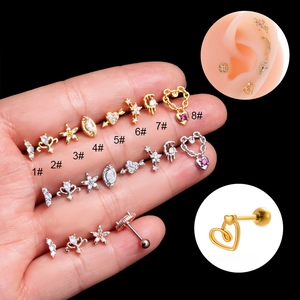 Detail showing eight stainless steel stud earring designs in gold, silver, and rose gold
