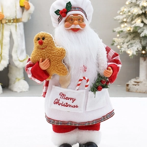 Standing Santa chef figurine with gingerbread man ornament for Christmas tabletop decor