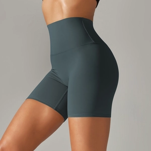Detail view of high-waist fitness shorts in dark grey green with reinforced flat seams