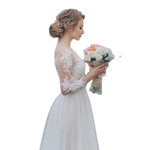 Elegant white lace long sleeve wedding dress with sheer tulle ball gown skirt and floral embroidery
