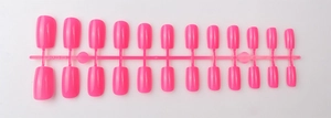 Detailed view of 24 long square fuchsia press-on nails with high gloss UV coating