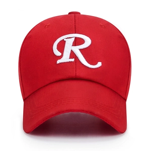 Red cotton baseball cap with white embroidered letter R and curved brim on white background