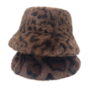 Detail of plush leopard print bucket hat and matching faux fur neck warmer set