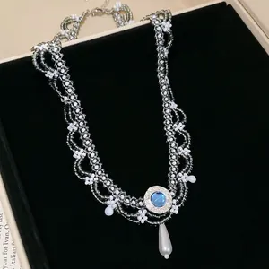 Elegant vintage beaded lace necklace with blue stone pendant and white drop pearl