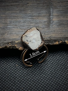 Macro detail of raw crystal ring with 1.6cm inner diameter and adjustable bronze wire band
