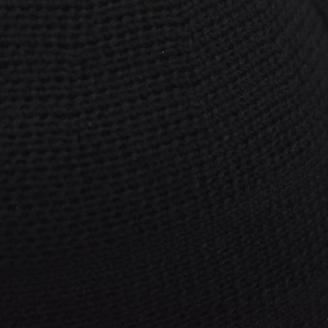 Close-up of high-quality black knitted fabric texture for a breathable witch hat