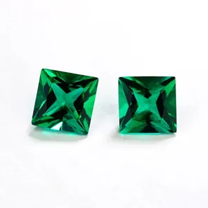 Deep green square princess cut synthetic emerald gemstones shown on a white background