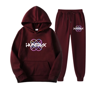 Detail view of burgundy Ivan Cornejo hoodie and sweatpants set with graphic logos