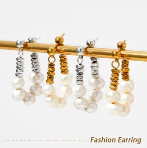 Detailed shot of French style beaded hoop earrings with natural freshwater pearls