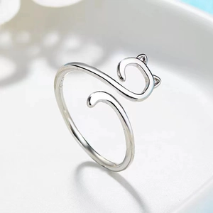 Close-up of S925 hallmark on polished silver cat ring with minimalist adjustable design