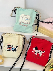 Cute canvas drawstring bucket bags with animal embroidery in green, beige, and red colors