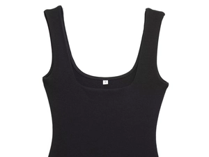 Close-up of black ribbed knit dress neckline with thin straps and size S label detail
