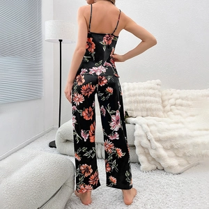 Women's black floral print satin pajama set with camisole top and long pants back view