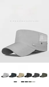 Detail of breathable mesh side panel and metallic fashion badge on men's summer sun hat